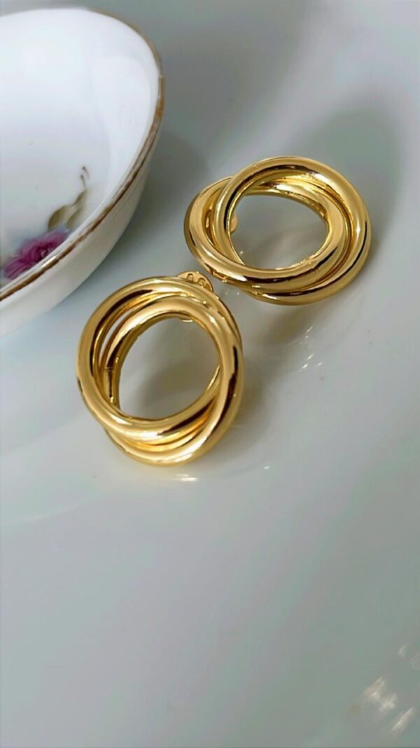 BRINCO FRONTAL ELOS TUBULARES GD. C/ TARRAXA BANHADO A OURO 18K